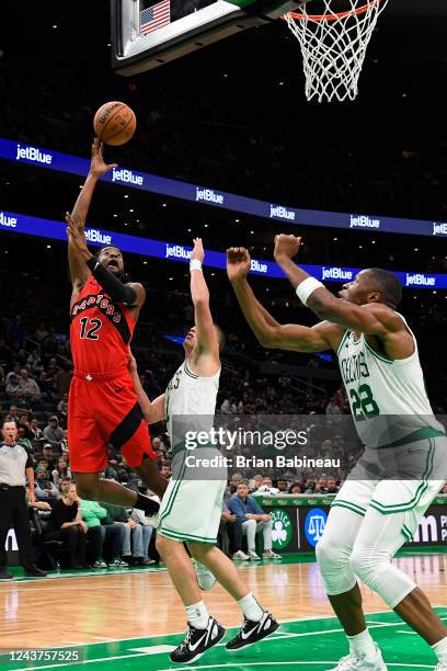 Josh Jackson of the Toronto Raptors drives to the basket during the game against the Boston Celtics on October 5, 2022 at the TD Garden in Boston,...