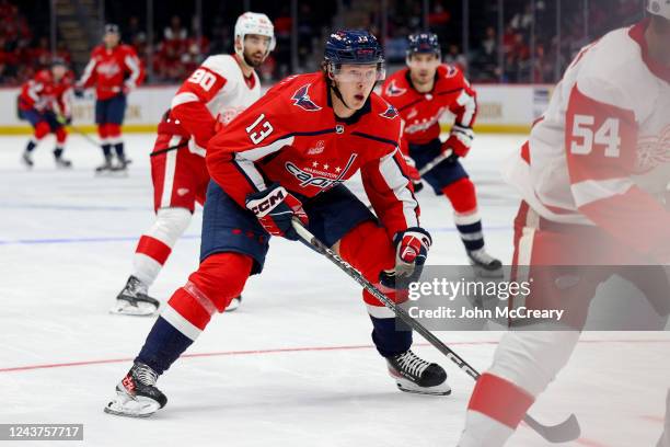 Henrik Borgstrom of the Washington Capitals pursues the puck carrier during a pre-season game against the Detroit Red Wings at Capital One Arena on...