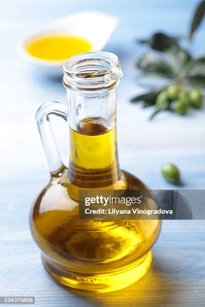 olive oil - oil bottle stock pictures, royalty-free photos & images