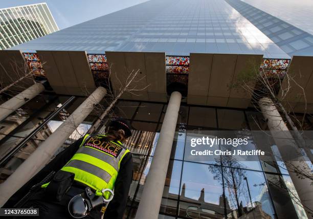 Police attend the scene of a stabbing outside 22 Bishopsgate in the city of London on October 6, 2022 in London, England. City of London Police said...