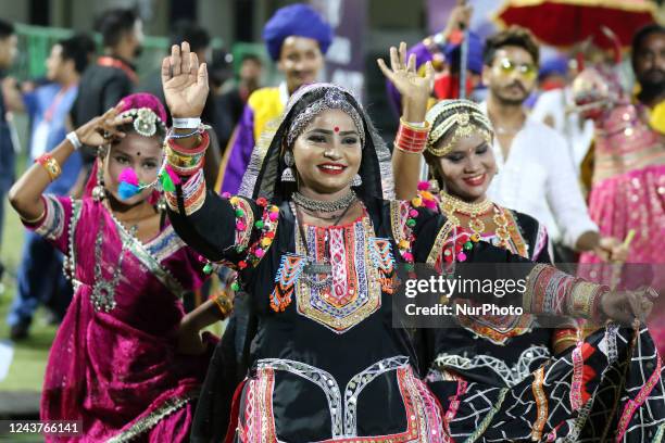 Folk artists perform during the Legends League Cricket T20 final match between India Capitals and Bhilwara Kings at Sawai Mansingh Stadium , in...