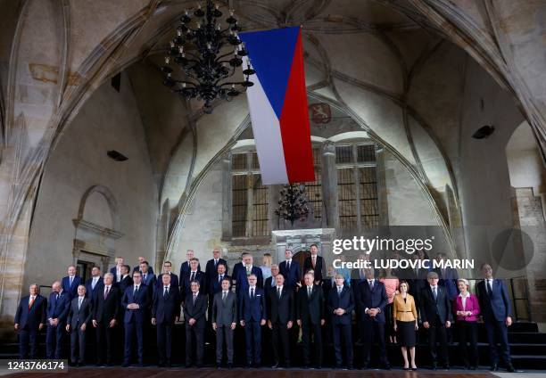 Leaders from Ukraine, Britain and Turkey and their EU counterparts pose for a family photograph under a Czech national falg at the European Summit...