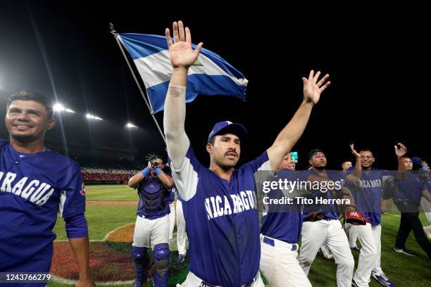 Members of Team Nicaragua celebrate after defeating Team Brazil to qualify for the 2023 World Baseball Classic at Rod Carew National Stadium on...