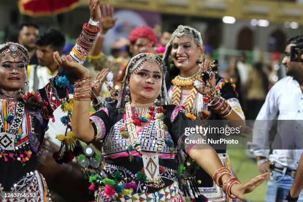 Folk artists perform during the Legends League Cricket T20 final match between India Capitals and Bhilwara Kings at Sawai Mansingh Stadium , in...