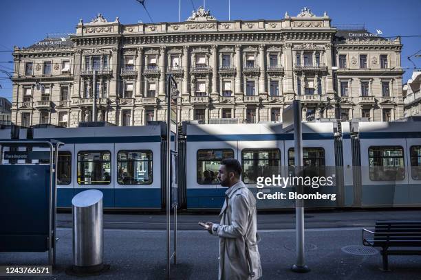 Tram passes the Credit Suisse Group AG headquarters in Zurich, Switzerland, on Wednesday, Oct. 5, 2022. Credit Suisse has become a poaching ground...
