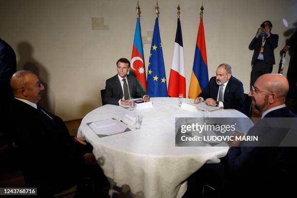 Azerbaijan's president Ilham Aliyev , French President Emmanuel Macron , Armenia's Prime Minister Nikol Pashinyan and President of the European...