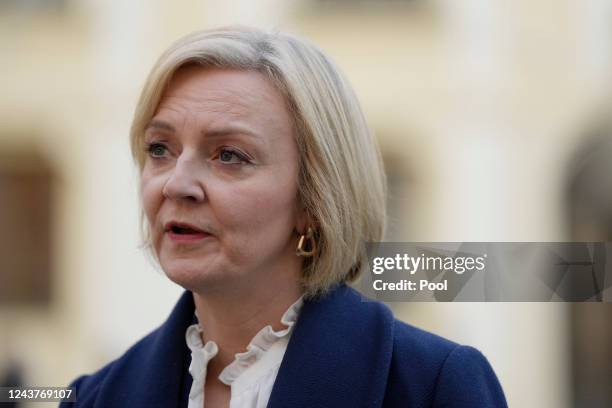 British Prime Minister Liz Truss makes a press statement after a meeting of the European Political Community at Prague Castle on October 6, 2022 in...