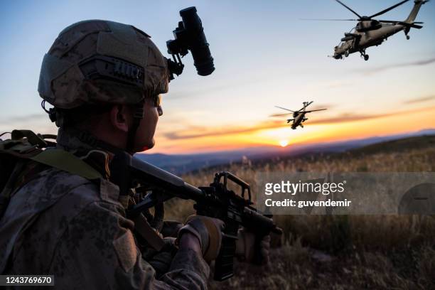 military mission at sunrise - army helmet stock pictures, royalty-free photos & images