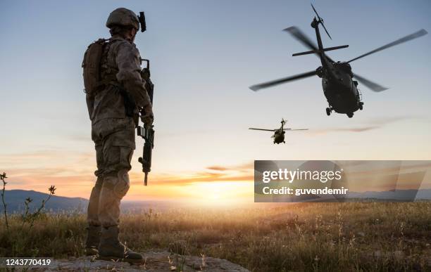 military mission at sunrise - military helicopter stock pictures, royalty-free photos & images