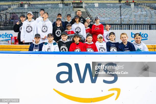 Tomas Hertl of the San Jose Sharks poses for a photo with the Goals & Dream hockey team, after open practice during the NHL Global Series at O2 Arena...