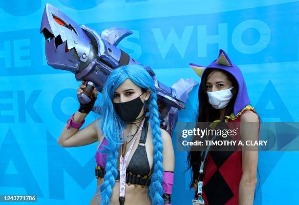 Cosplayers arrive for the first day of the New York Comic Con 2022 at the Jacob Javits Center in New York on October 6, 2022. - The four-day event is...