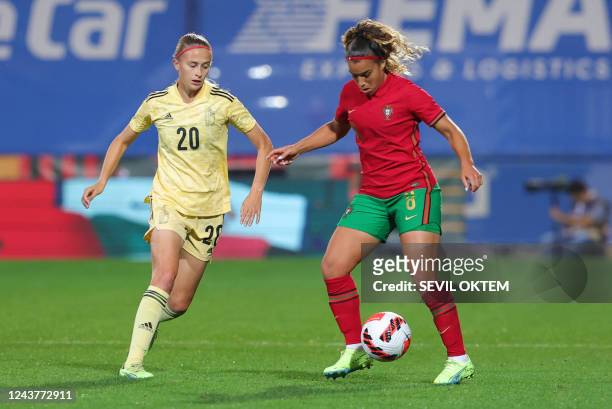 Belgium's Julie Biesmans and Portugal's Andreia Norton pictured in action during a soccer game between Portugal and Belgium's national team the Red...