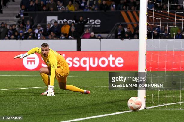 Ludogorets' Dutch goalkeeper Sergio Padt looks the ball pass by during the UEFA Europa League group C football match between HJK Helsinki and...
