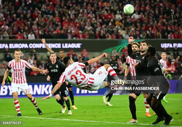 Cologne's Armenian forward Sargis Adamyan tries to score during the European Conference League 1st Round Group D football match FC Cologne vs...