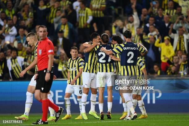 Fenerbahce's players celebrate after AEK Larnaca's Cypriot midfielder Rafail Mamas scored an own goal during the UEFA Europa League Group B football...