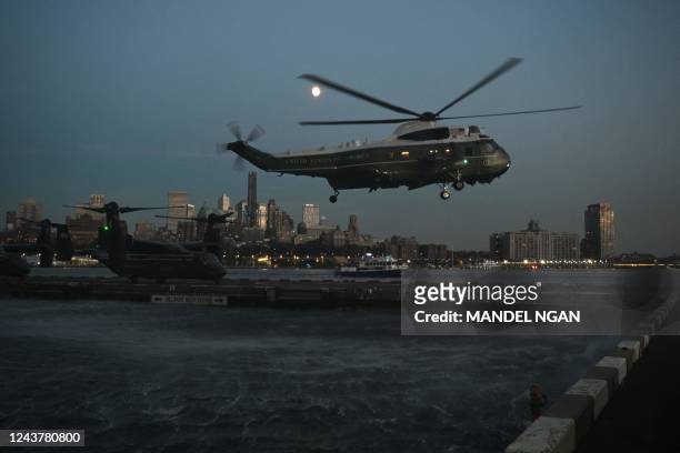 Marine One carrying US President Joe Biden lands at the Wall Street landing zone in New York on October 6, 2022. - Biden is in New York to attend a...