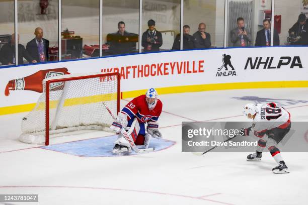 Tim Stützle of the Ottawa Senators scores on a penalty shot against Cayden Primeau of the Montreal Canadiens during the second period at the Steele...