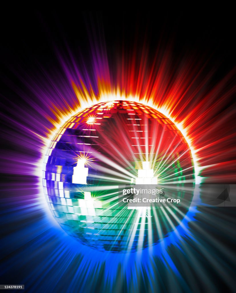 Disco ball with multi coloured rays of light