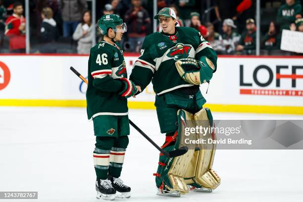 Jared Spurgeon and Marc-Andre Fleury of the Minnesota Wild celebrate a 4-1 victory against the Chicago Blackhawks during a preseason game at Xcel...