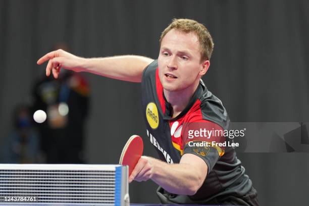 Duda Benedikt of Team Germany plays a forehand against Felix Lebrun of France during 2022 ITTF World Team Championships Finals - Men's...
