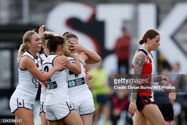 Keeley Skepper of the Blues celebrates a goal with teammates during the 2022 S7 AFLW Round 07 match between the St Kilda Saints and the Carlton Blues...