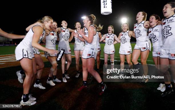 Taylor Ortlepp of the Blues sings the team song during the 2022 S7 AFLW Round 07 match between the St Kilda Saints and the Carlton Blues at RSEA Park...