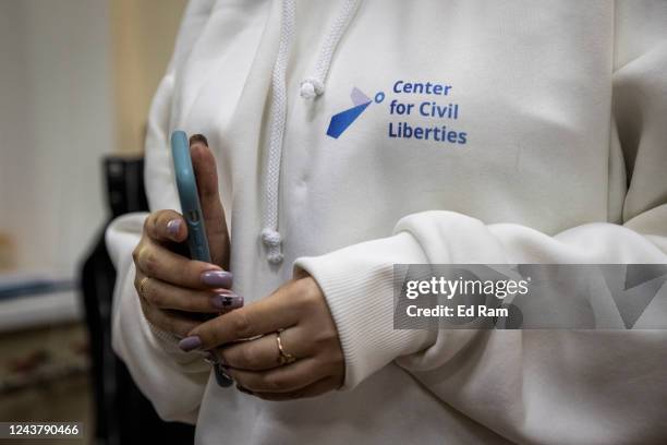 Staff at the Centre for Civil Liberty wear branded hoodies as they celebrate in their office on October 7, 2022 in Kyiv, Ukraine. The Ukrainian human...