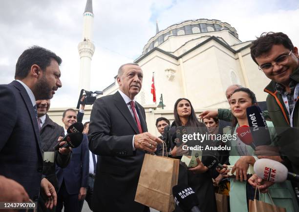 Turkish President Recep Tayyip Erdogan distributes Turkish bagel to mark the Mawlid al-Nabi after performing Friday prayer at Hz. Ali Mosque in...