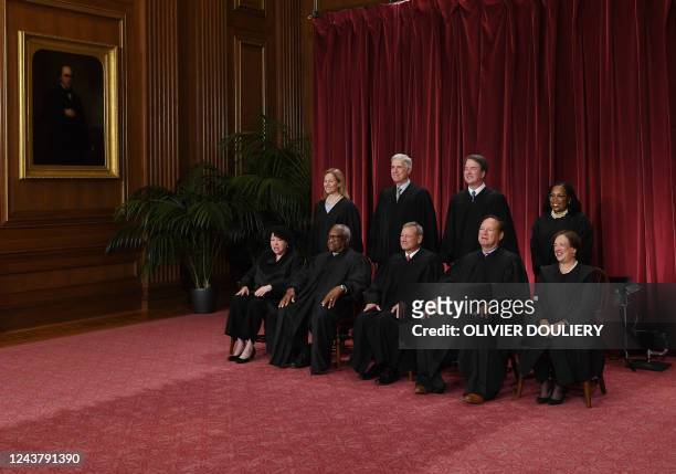 Justices of the US Supreme Court pose for their official photo at the Supreme Court in Washington, DC on October 7, 2022. Associate Justice Sonia...