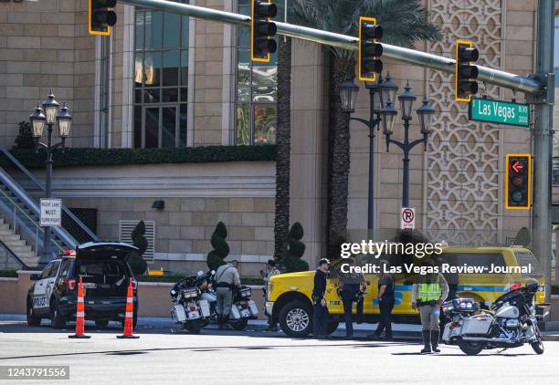 Police at the scene where multiple people were stabbed in front of a Strip casino in Las Vegas, Thursday, Oct. 6, 2022.