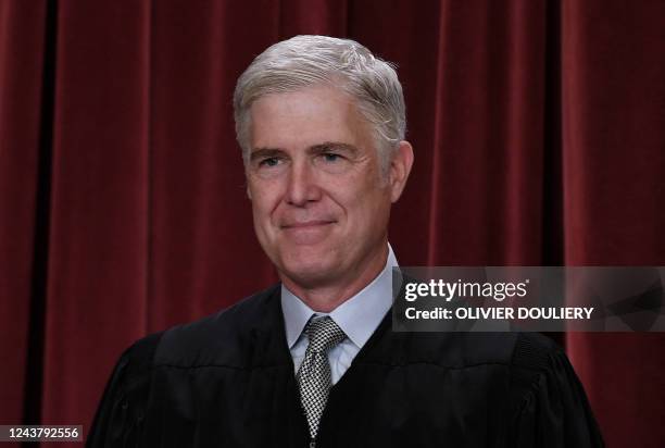 Associate US Supreme Court Justice Neil Gorsuch poses for the official photo at the Supreme Court in Washington, DC on October 7, 2022.