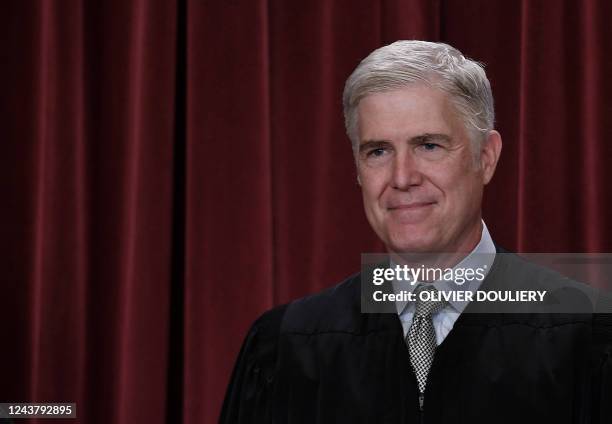 Associate US Supreme Court Justice Neil Gorsuch poses for the official photo at the Supreme Court in Washington, DC on October 7, 2022.