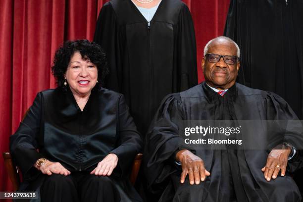 Associate Justice Sonia Sotomayor, left, and Associate Justice Clarence Thomas during the formal group photograph at the Supreme Court in Washington,...