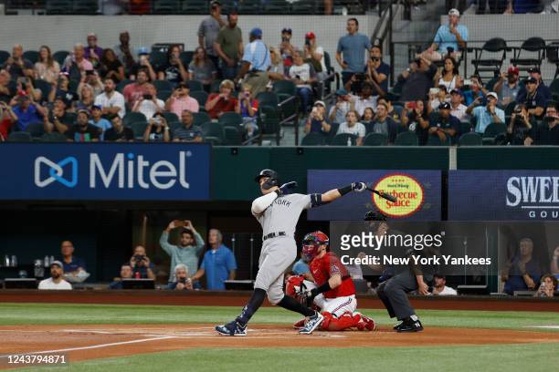 Aaron Judge of the New York Yankees hits his 62nd home run of the season, breaking the American League home run record against the Texas Rangers at...