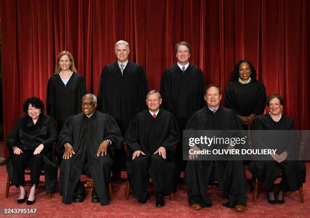 Justices of the US Supreme Court pose for their official photo at the Supreme Court in Washington, DC on October 7, 2022. Associate Justice Sonia...