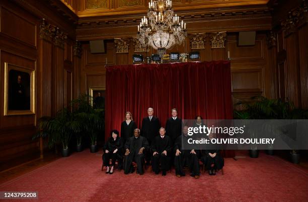 Justices of the US Supreme Court pose for their official photo at the Supreme Court in Washington, DC on October 7, 2022. Associate Justice Sonia...