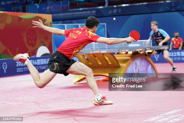 Long Ma of China play a forehand against Truls Moregard of Sweden during 2022 ITTF World Team Championships Finals - Men's Teams-Ouarterfinals on Day...