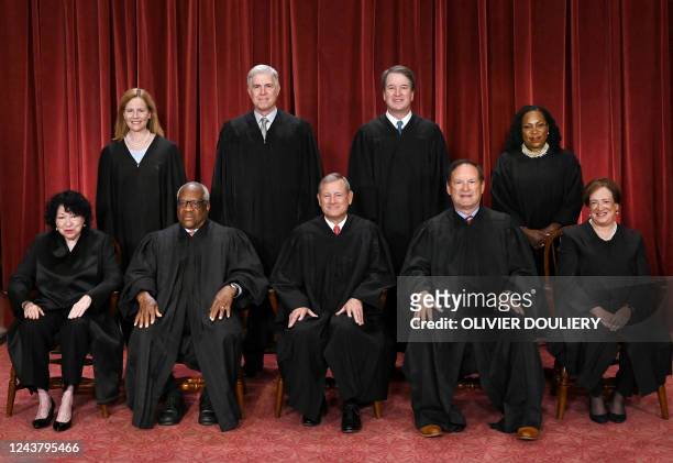 Justices of the US Supreme Court pose for their official photo at the Supreme Court in Washington, DC on October 7, 2022. Associate Justice Sonia...
