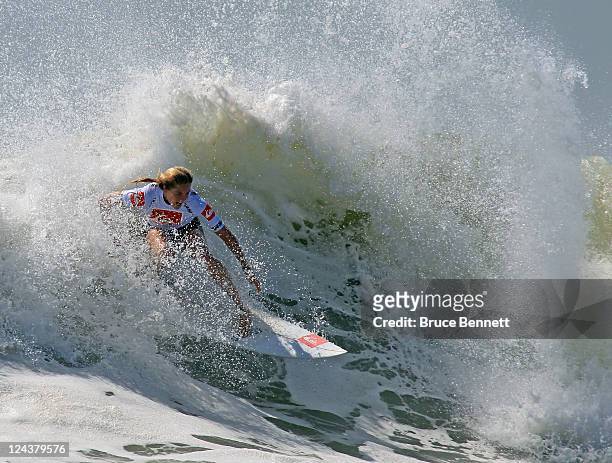 Four time world champion Stephanie Gilmore rides the waves during an exhibition round at the Quiksilver Pro New York tournament on September 9, 2011...