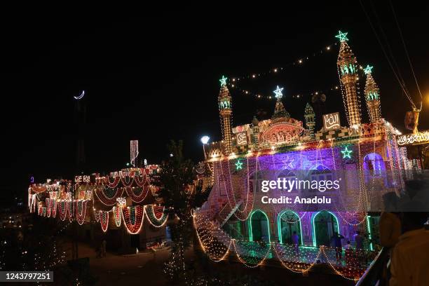 Mosque is illuminated with lights for the celebrations for Mawlid al-Nabi, birth anniversary of Muslims' beloved Prophet Mohammad, in Rawalpindi,...