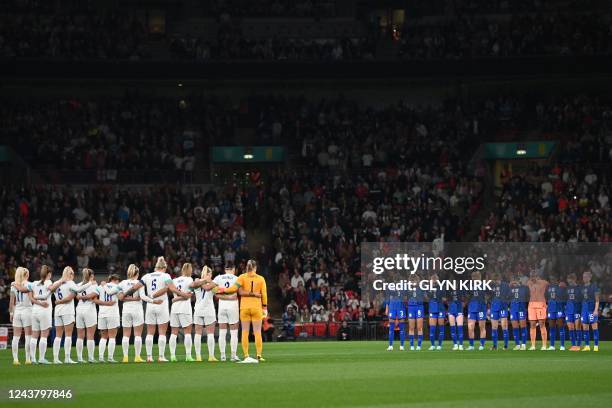 Players from both teams have a minute of silence in tribute to the 131 victims of the Indonesia stadium tragedy prior to the Women's friendly...