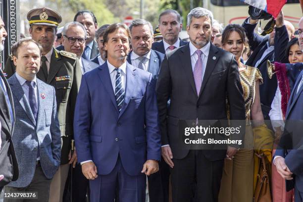 Luis Lacalle Pou, Uruguay's president, center left, and Mario Abdo Benitez, Paraguay's president, center right, attend an event at the Paraguayan...