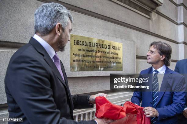 Mario Abdo Benitez, Paraguay's president, left, and Luis Lacalle Pou, Uruguay's president, attend an event at the Paraguayan embassy in Montevideo,...