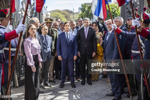 Luis Lacalle Pou, Uruguay's president, center left, and Mario Abdo Benitez, Paraguay's president, center right, attend an event at the Paraguayan...