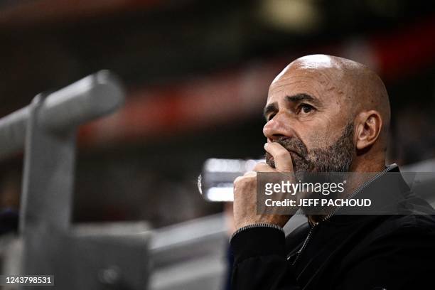 Lyons Dutch head coach Peter Bosz looks on before the French L1 football match between Olympique Lyonnais and Toulouse at The Groupama Stadium in...