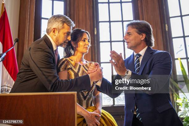 Mario Abdo Benitez, Paraguay's president, from left, Silvana Lopez Moreira, Paraguay's first lady, and Luis Lacalle Pou, Uruguay's president, attend...