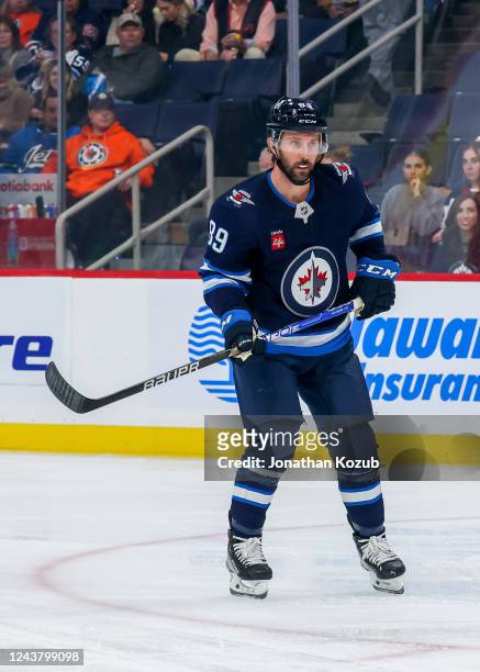 Sam Gagner of the Winnipeg Jets keeps an eye on the play during first period action against the Calgary Flames in a pre-season game at Canada Life...