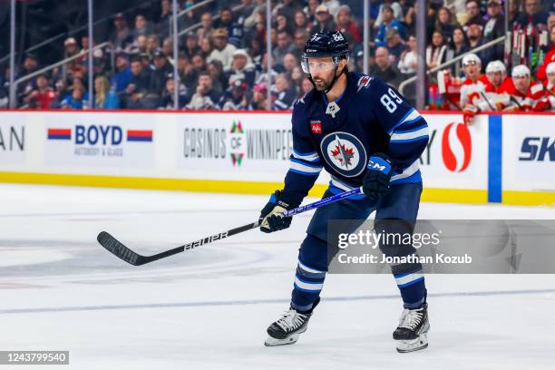 Sam Gagner of the Winnipeg Jets keeps an eye on the play during second period action against the Calgary Flames in a pre-season game at Canada Life...