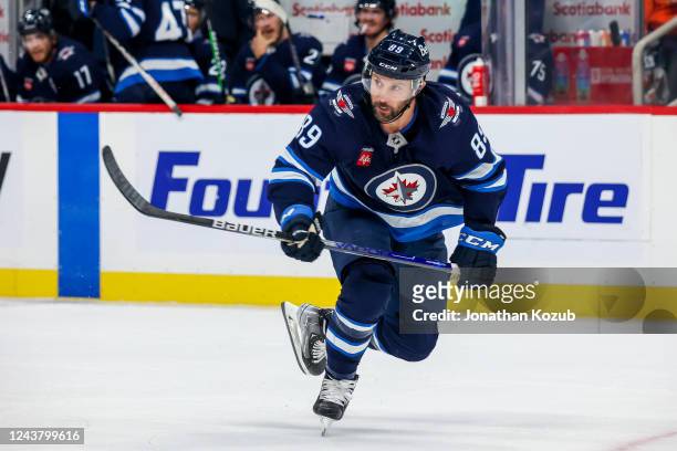 Sam Gagner of the Winnipeg Jets follows the play up the ice during second period action against the Calgary Flames in a pre-season game at Canada...