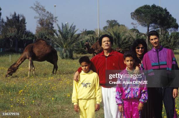 Libyan leader Muammar Gaddafi poses with wife Safia and sons Seif al-Arab, known as Aruba, Khamis and Moatassem-Billah in the military barrackwith...